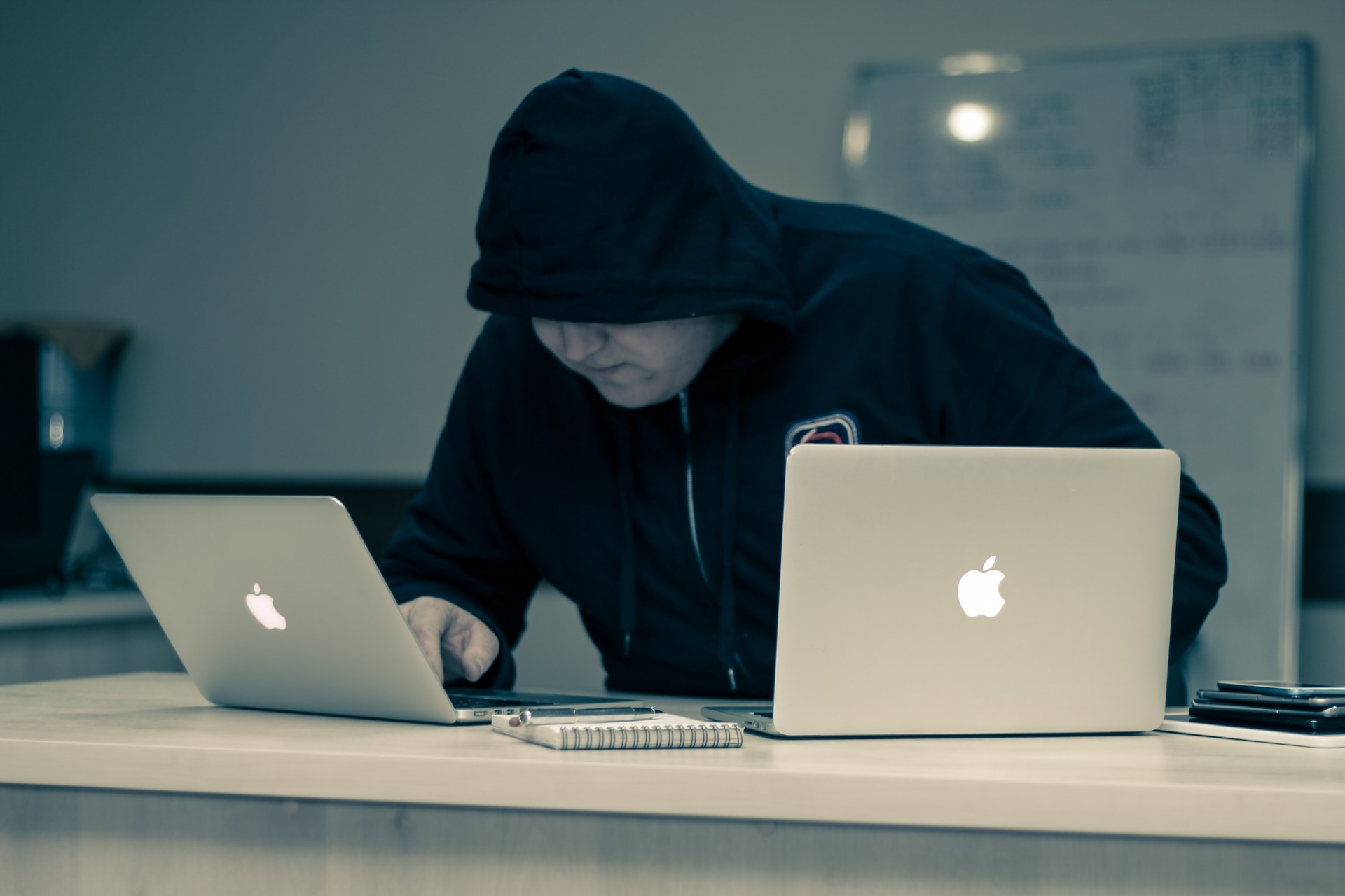 hacker-with-2-laptops